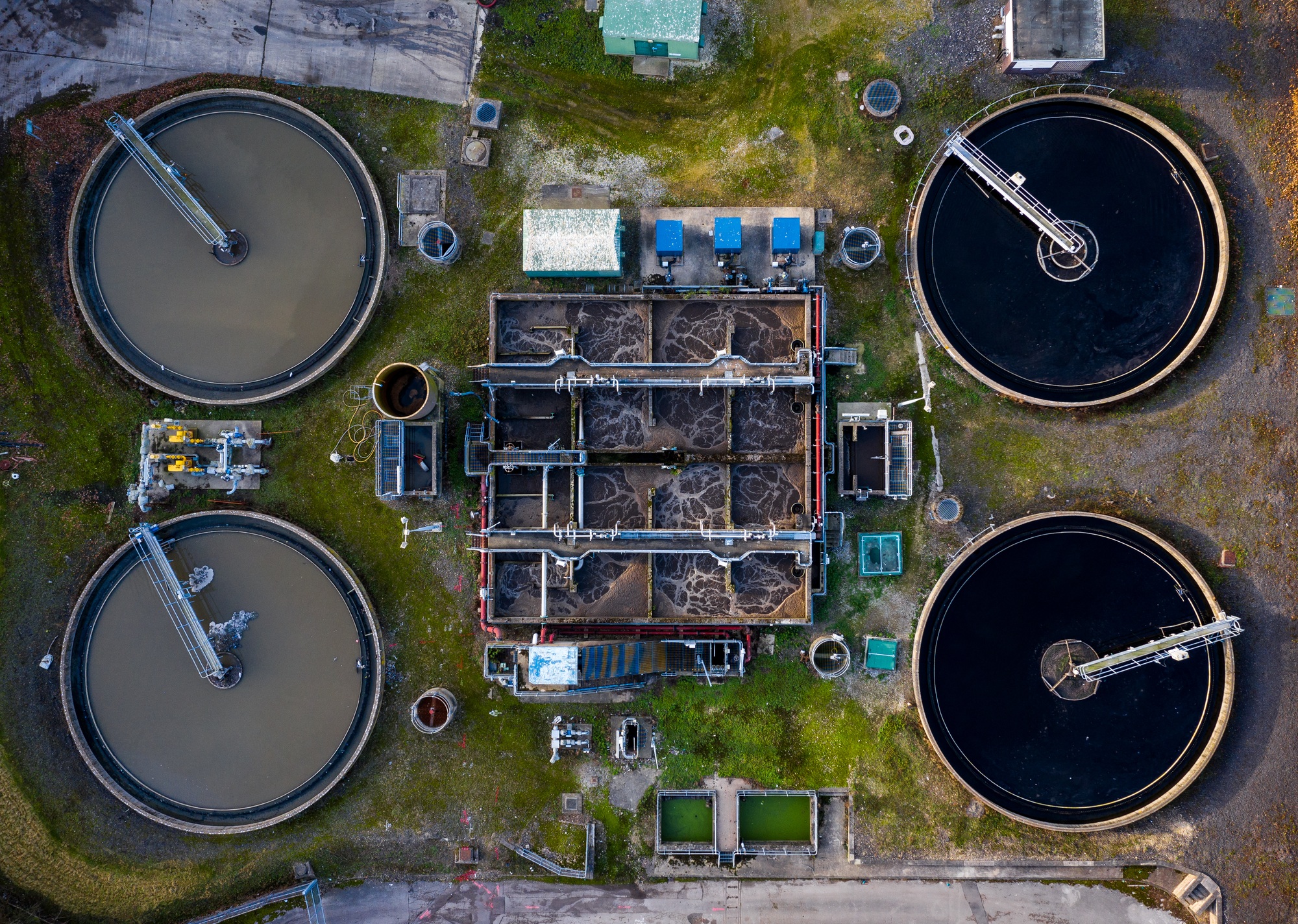 Aerial view of waste water treatment works with tanks purifying drinking water